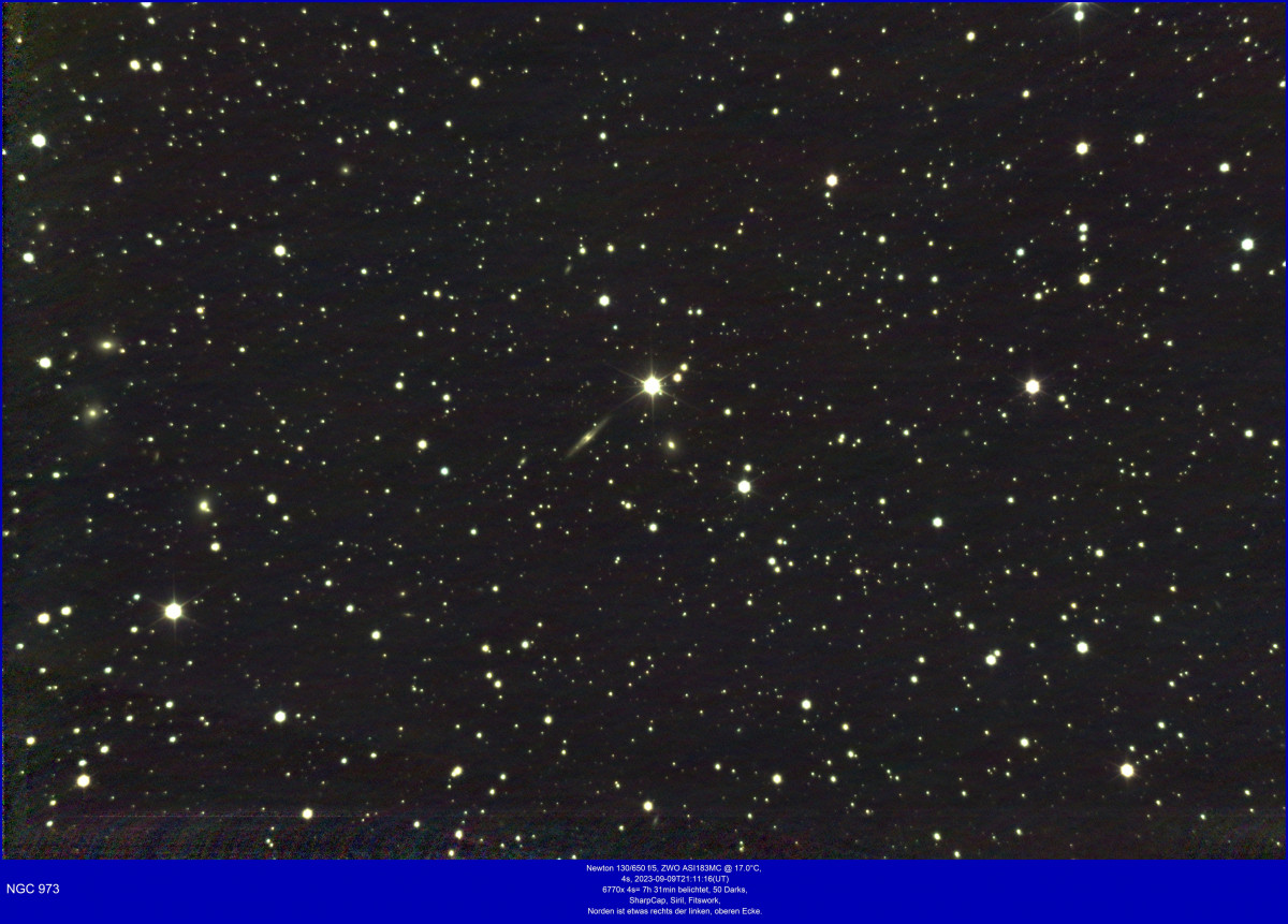 NGC 973, Galaxie im Dreieck