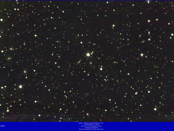 NGC 973, Galaxie im Dreieck