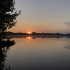 Sonnenaufgang mit Spiegelung