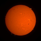 Sonne im H Alpha Licht mit ISS